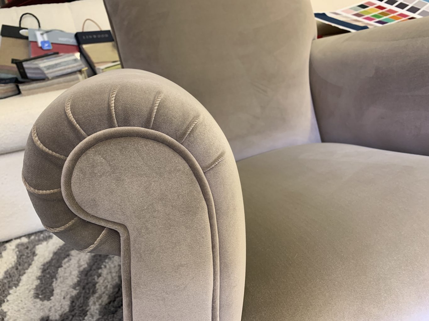 Reupholstered occasional chair.
