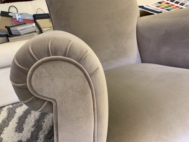 Reupholstered occasional chair.
