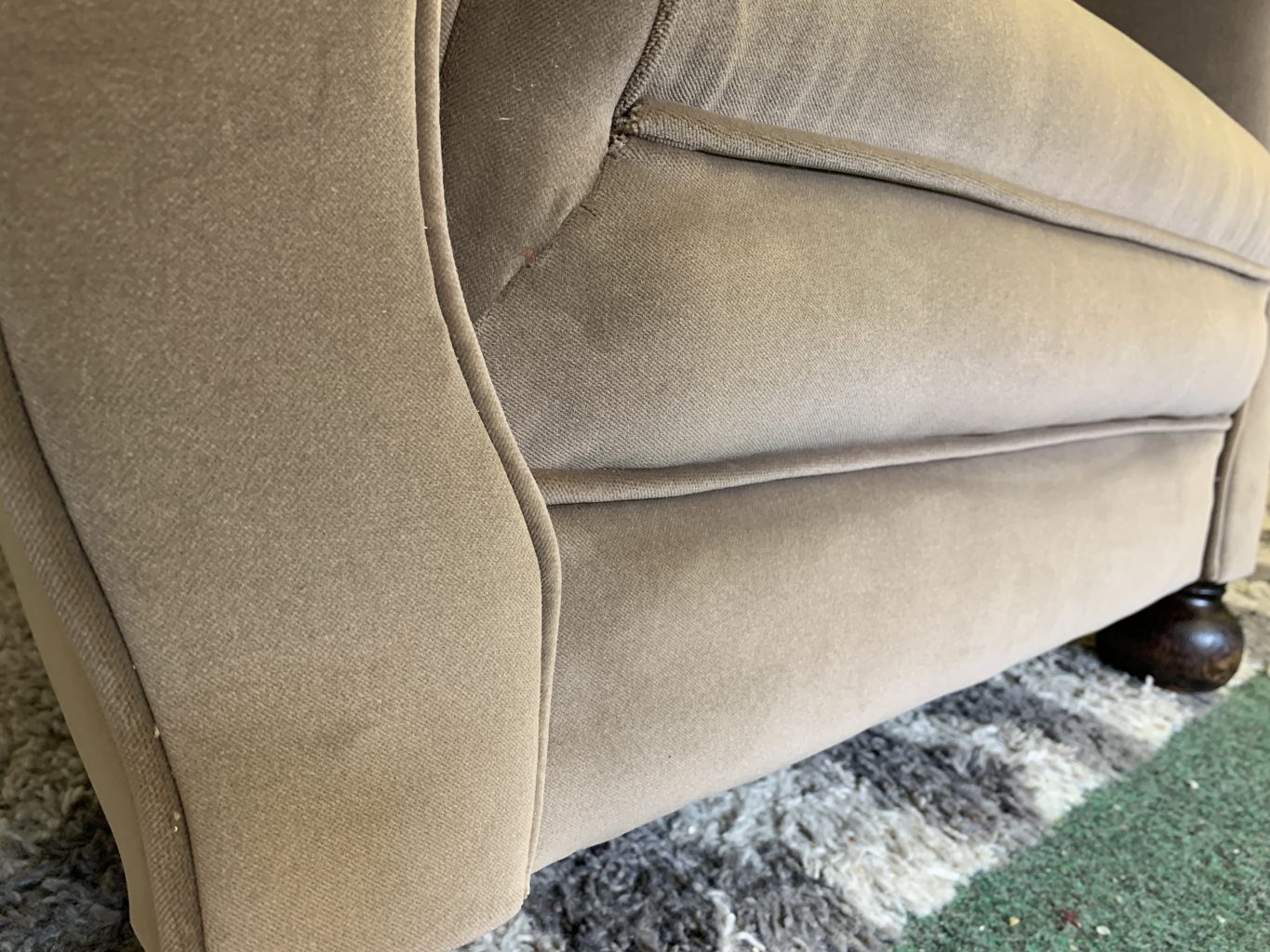 Reupholstered occasional chair.