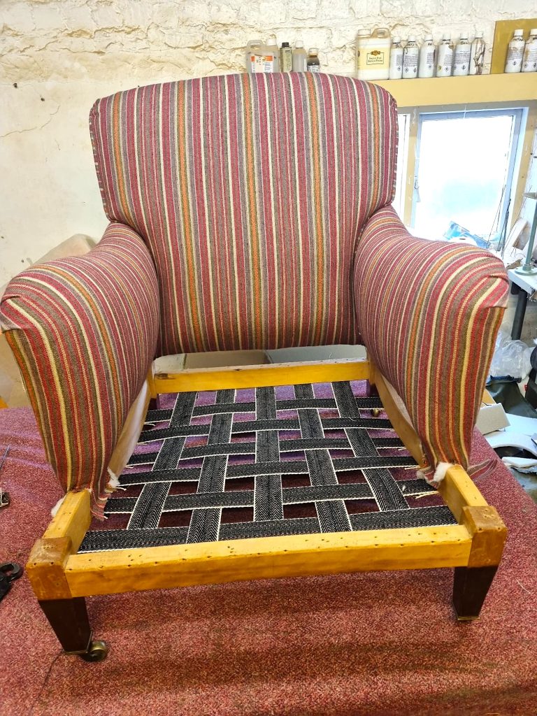 Restored original Howard armchair upholstered in luxury GP & J Baker fabric