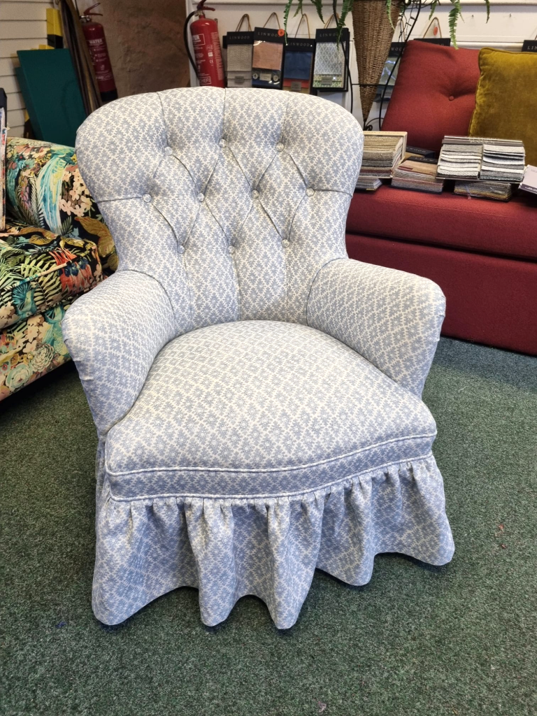 Restored nursing chair reupholstered in Linwood Waterfall fabric by BJ Upholstery