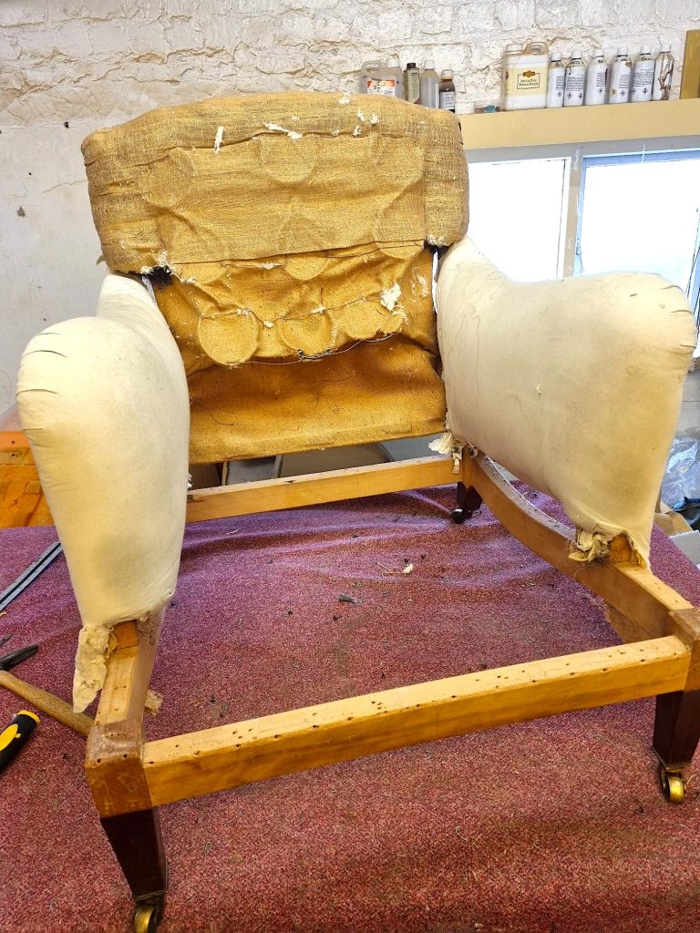 Restored original Howard armchair upholstered in luxury GP & J Baker fabric